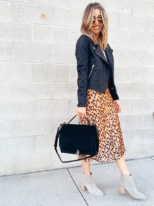 dallas fashion blogger wearing topshop faux leather jacket and leopard midi skirt and rebecca minkoff black suede satchel