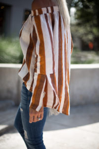 brown and orange striped top / distressed denim / taupe suede booties / jaime shrayber