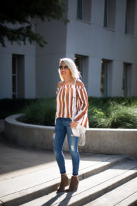 OTS fall colored top / distressed skinny jeans / off white crossbody bag / suede booties for fall