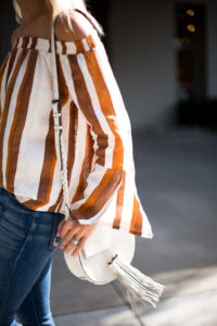 striped off the shoulder slit sleeved top / white tassel crossbody / jaime shrayber / fall fashion style