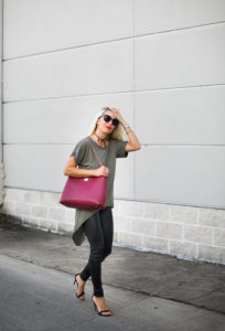 high low hem t shirt for fall, black leather pants, black choker with a bow, red gigi new york hobo,