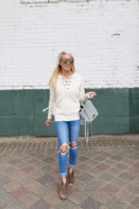 lace-up sweaters for fall, chunky sweaters, chunky ivory sweater, girlfriend jeans with ripped knees, brown mirrored sunglasses