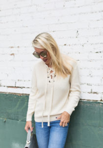 chunky ivory sweater for fall, lace-up from sweaters, tie front tops, medium wash distressed girlfriend jeans, jaime shrayber