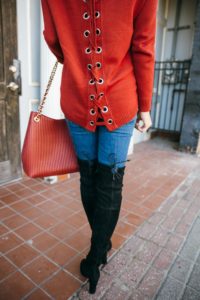 red sweater winter, red lace-up sweater, black heeled over the knee boots, over the knee boots that stay up, jaime shrayber