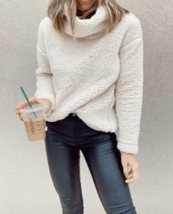 target cream sherpa turtleneck pullover and black faux leather leggings casual holiday party outfit