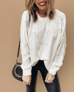 off white beaded embellished sweater with black faux leather leggings dressy christmas holiday party outfit idea