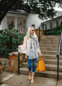bell sleeve blouses for winter, pastel check print blanket scarf, pastel oversized scarf, frayed hem denim jeans, suede lace up pumps