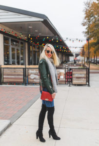 button down fitted shirt, classic plaid button down, black suede over the knee boots, holiday red crossbody bag, green leather jacket