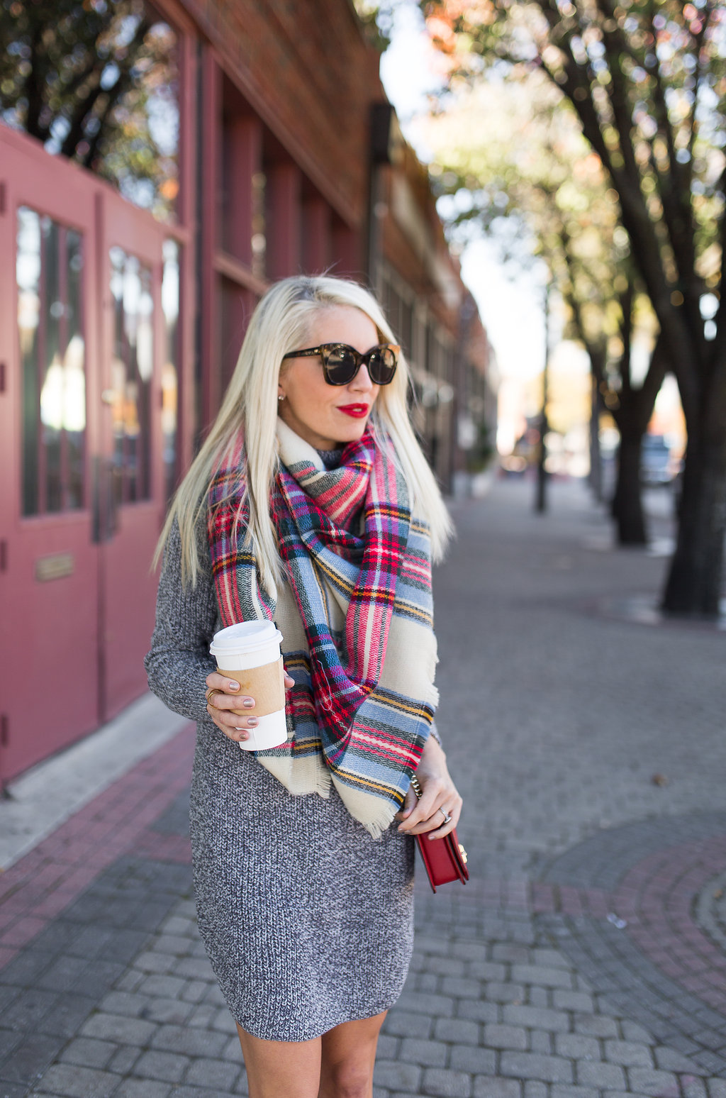 famous zara blanket scarf worn with grey sweater dress and red boots
