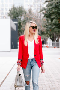 red blazer with embellished sleeves, red one button blazer, distressed whiskered skinny jeans, white v-neck tee