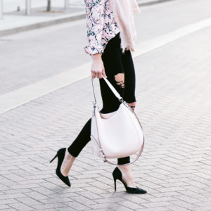 floral button down, printed blush blouse, distressed black denim, blush handbag, closed toe black pumps