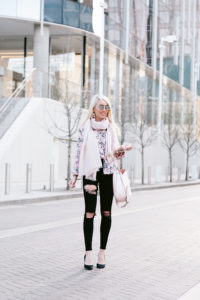 round mirrored sunglasses, black denim with rips, ripped up black denim, spring scarf, light pink statement drop earrings