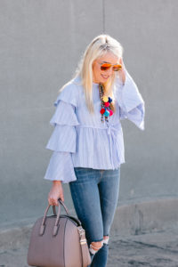tiered sleeve blouse, pale blue ruffled sleeve blouse, distressed denim under $100,