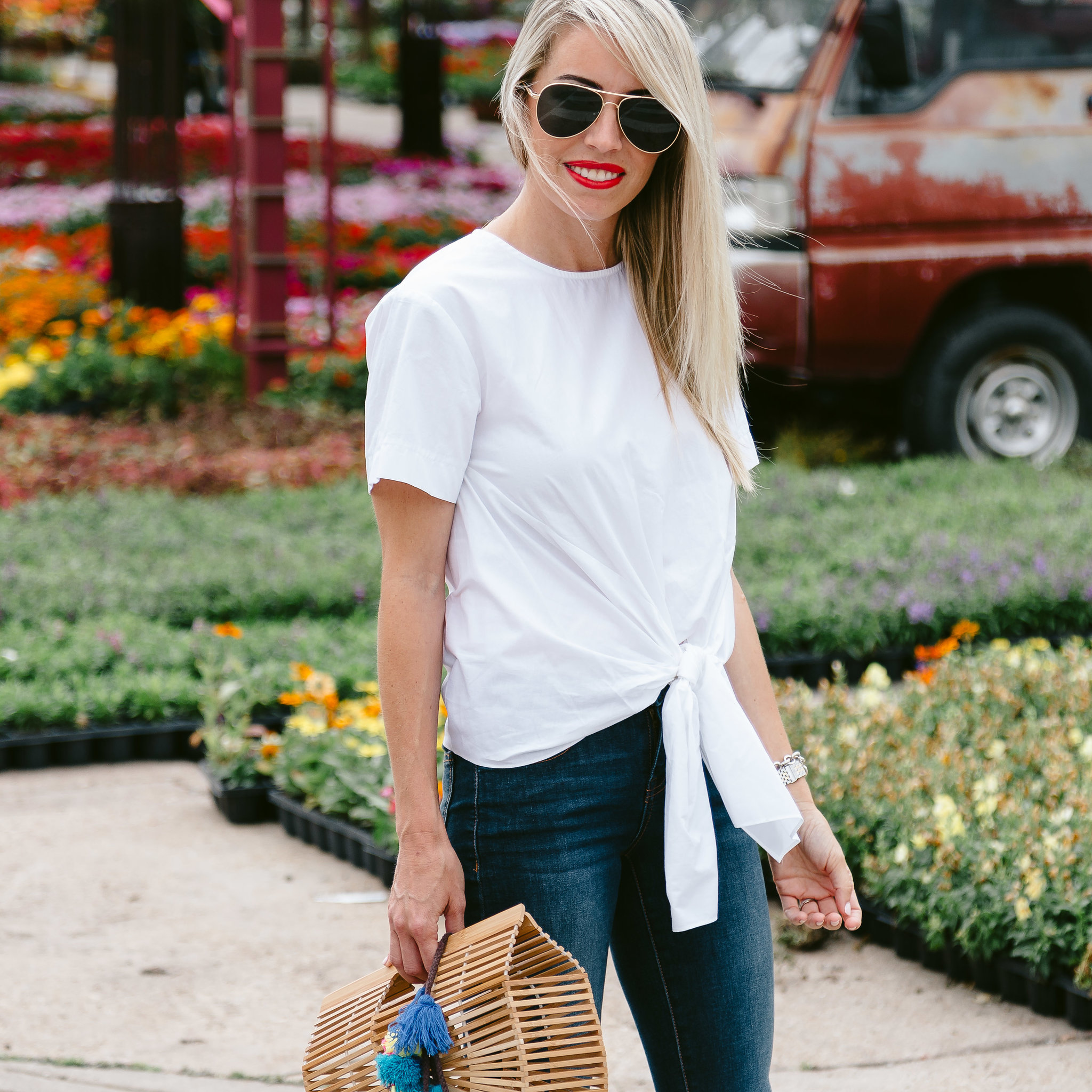 tie front white top worn with jeans and open toe sandals