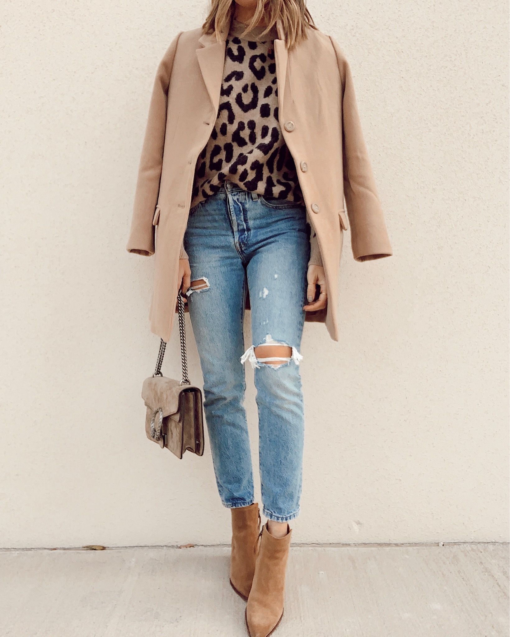 fall leopard sweater outfit idea with jeans and booties