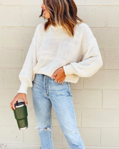 jaime shrayber wearing amazon turtleneck cream sweater with agolde riley high rise straight crop jeans