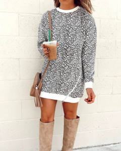 fashion blogger wearing revolve white leopard sweatshirt dress