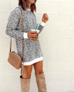 dallas fashion blogger wearing revolve white leopard sweatshirt dress