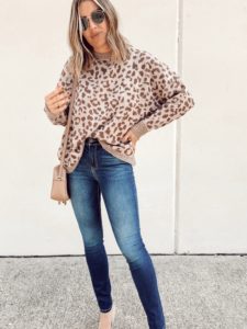 fashion blogger wearing walmart affordable leopard print sweater for fall