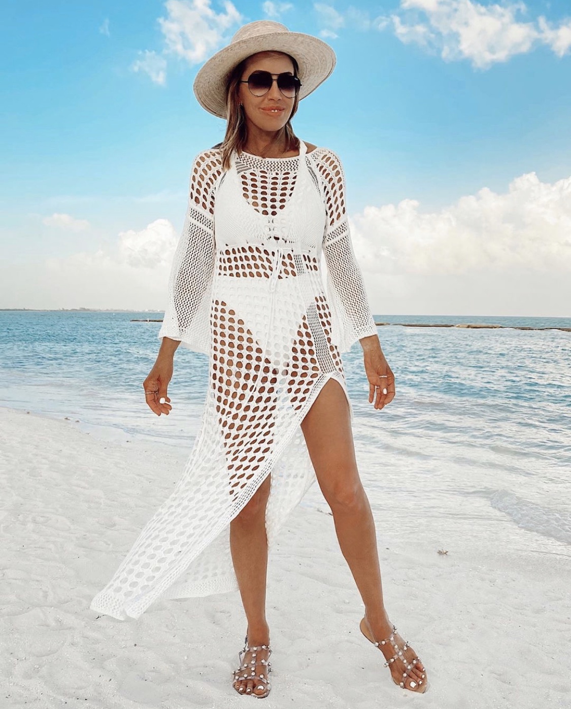 amazon white see through knit swimsuit coverup with leg slit and bell sleeves with two piece white swimsuit underneath