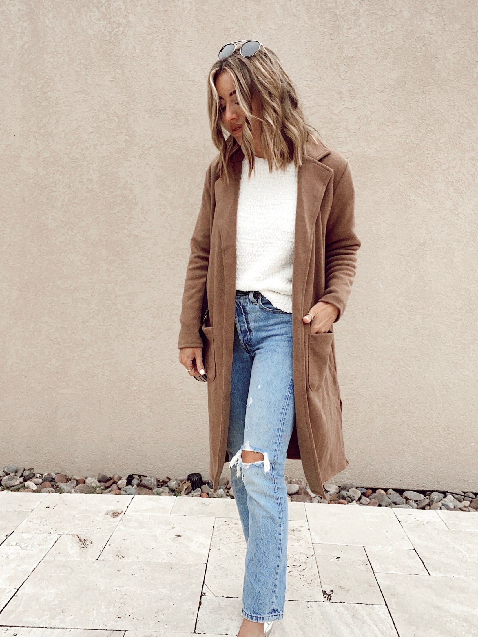 fashion blogger wearing brown long sweater coat with belt