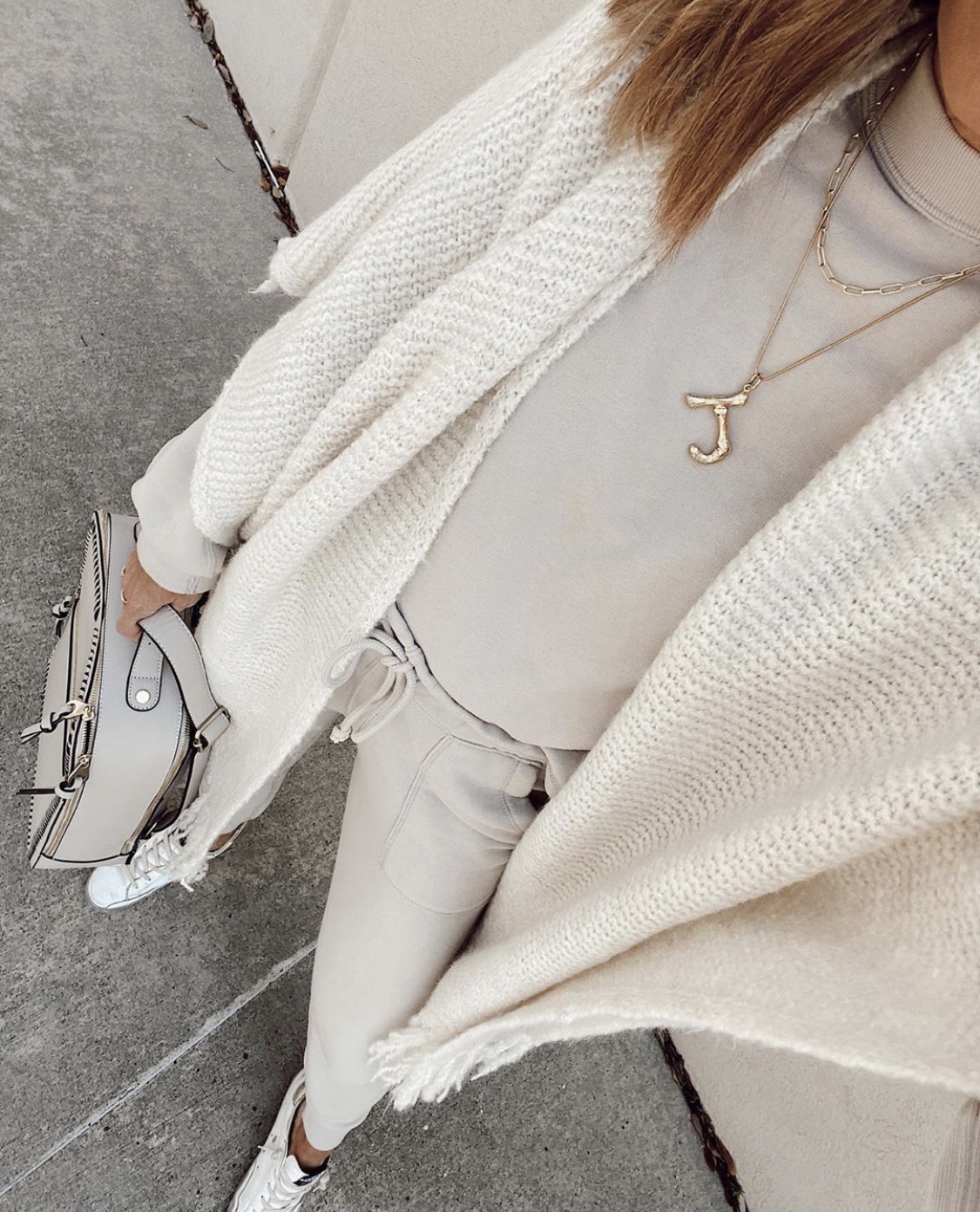 fashion blogger wearing affordable amazon initial necklace