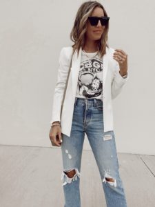 styling white blazer with graphic tee and distressed jeans