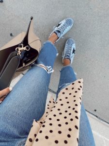 jaime shrayber wearing Levi’s wedgie icon fit ripped straight leg jeans with leopard golden goose sneakers