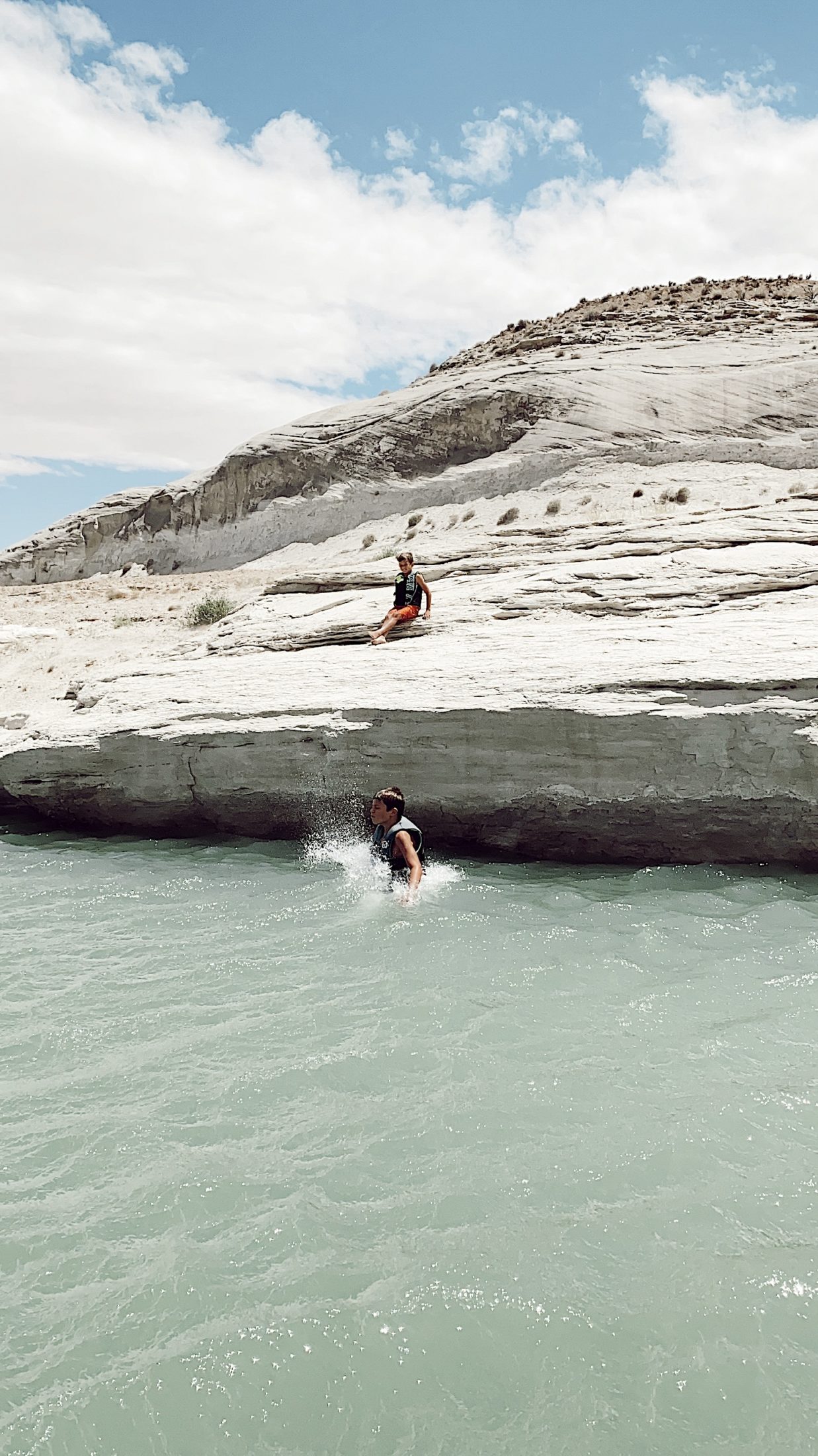 cliff jumping and swimming at lake powell in page arizona