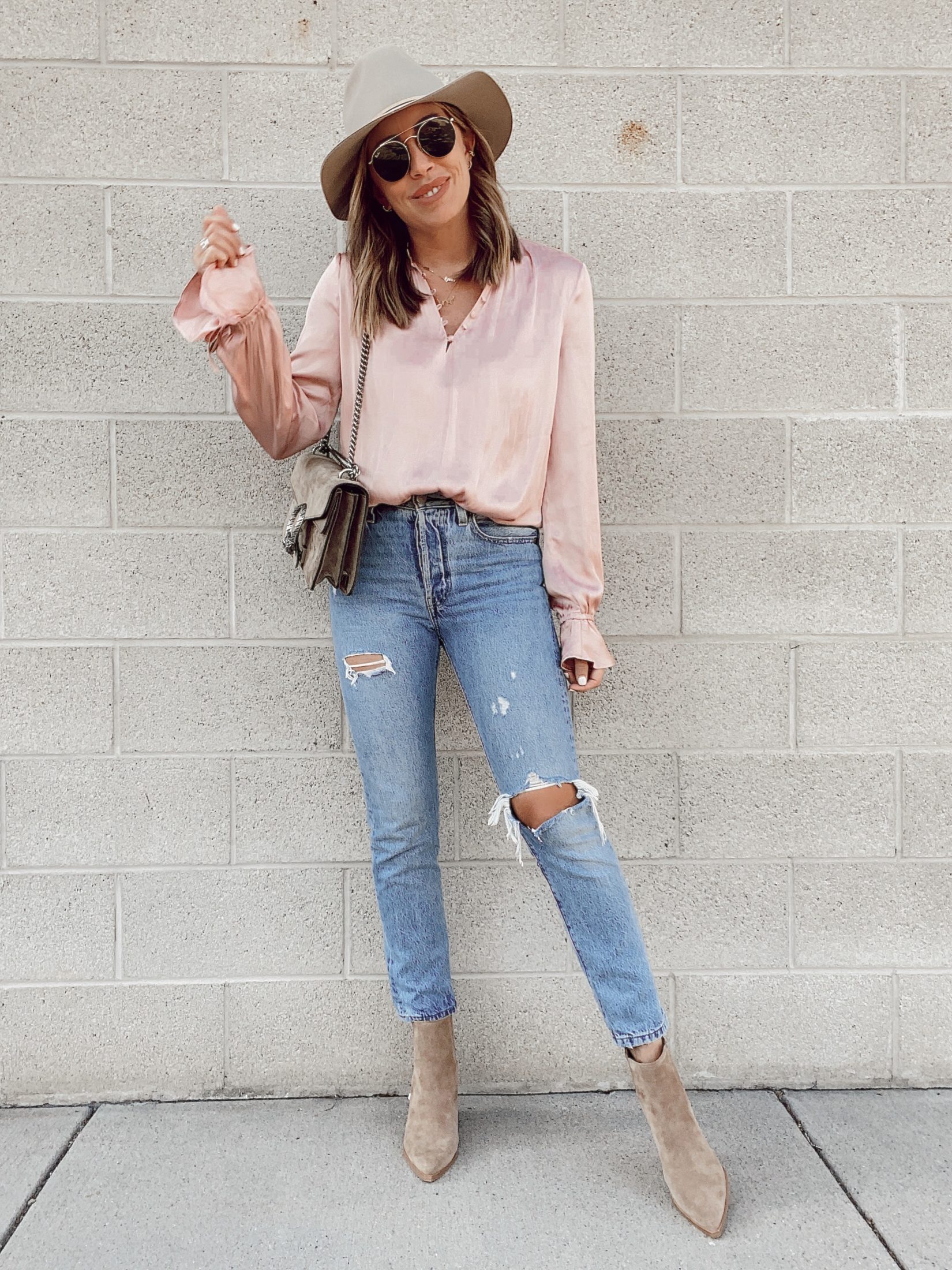fashion blogger wearing paige pink ana ruffle sleeve blouse from nordstrom