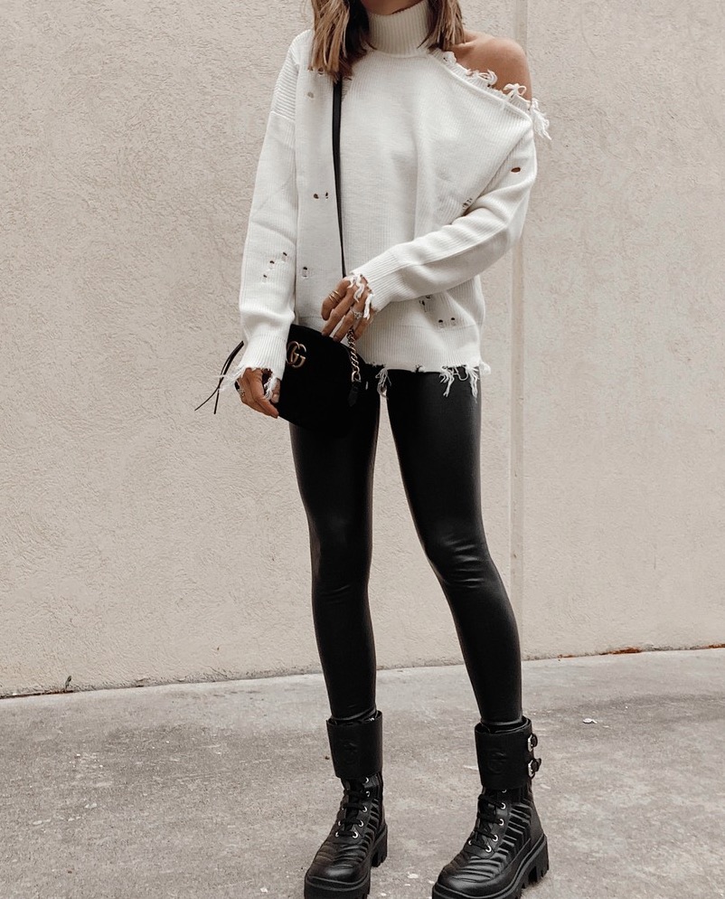 dressy sweater with faux leather leggings and combat boots