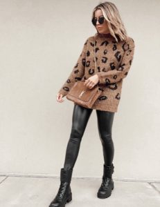 brown target leopard tunic sweater with black faux leather leggings and combat boots outfit