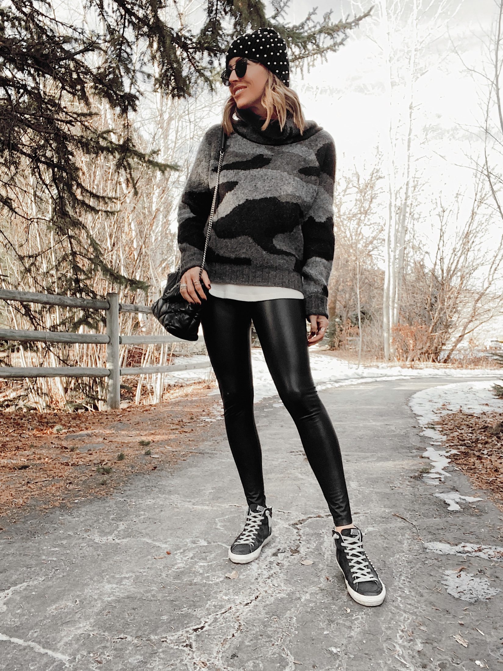 camo turtleneck sweater outfit with commando faux leather leggings and golden goose sneakers