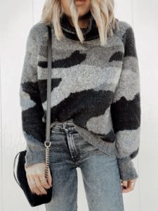 fashion blogger wearing gray camo turtleneck sweater