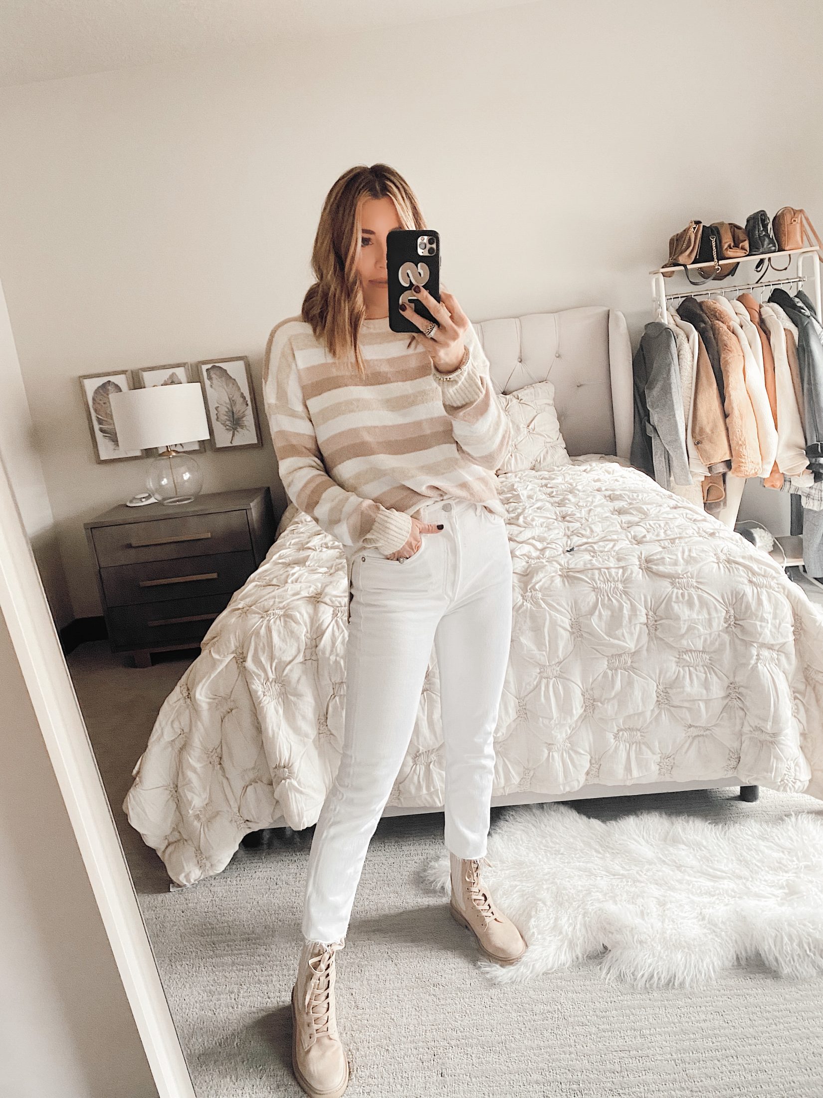 jaime shrayber wearing walmart time and tru stripe sweater with white jeans