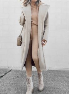 neutral matching loungewear set with shearling trench coat