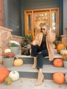 fashion blogger wearing cute fall outfit 2021
